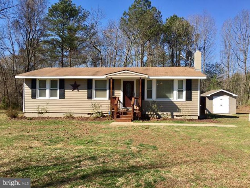 Come See & ENJOY this Beautifully RENOVATED home (2013) with ONE-LEVEL Living!   NO HOA, 1 acre, Over-sized Deck and Front Porch! Shed with Electric!  Upgraded Laminate Flooring throughout Main areas of Home with Ceramic Tile Bathroom.   Newer Kitchen Appliances (Brand New Microwave & Dishwasher)- Stainless Steel!   Enjoy "Simple living" as this home is turn key and READY FOR YOU!