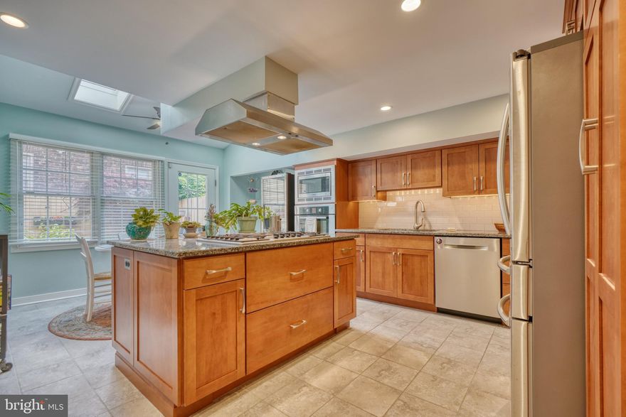 Situated between Federal Hill Park & Riverside Park, this stunning turn of the century 3 story residence has been well maintained & boasts all today's modern amenities.  As you enter the front door, the formal living room greets you w/ a  wood burning fireplace surrounded by custom built -ins, exposed beam ceiling & exposed brick.  Thru the living room enter the formal dining room and into the updated eat-in- kitchen, large center island cook-top, breakfast nook/sitting room w/ skylights allowing tons of natural light overlooking your private courtyard. Main level also features an updated half bath. 2nd level offers 2 BRs, 1FBA & laundry. 3rd level primary suite w/ 1 FBA & access to your roof terrace w/ sweeping panoramic views of downtown!  Updates Include: Main roof, upper skylights & upper gutters 2016, small shingle roof over kitchen & gutters 2020, HVAC & Tankless Water Heater 2014, Primary Bath 2017, other Baths updated 2021.