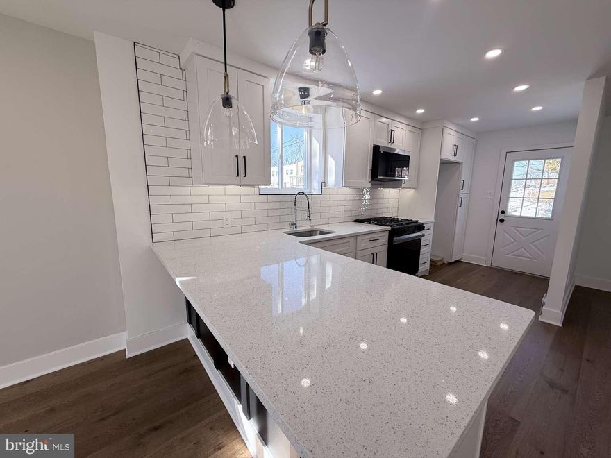 Enter into your new home where light and love is what you will walk into. This corner lot home in Toby Farms has a beautiful kitchen with new appliances such as a dishwasher, stove, beautiful light fixtures, and recess lighting, soft close cabinets. A kitchen bar to entertain guests. New engineered hardwood floor throughout the house. 3 bedrooms,2 bathrooms,1 is in the master bedroom. A finished basement and a driveway for private parking. It is move in ready, awaiting you to add your special touch to make it yours.