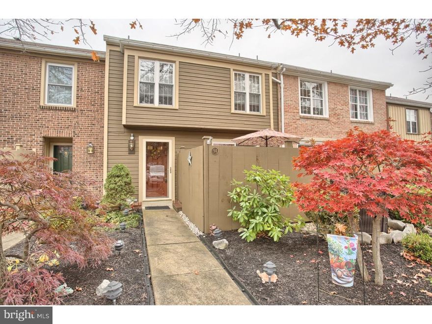 Beautiful, well maintained home with updates and upgrades galore! Nothing to do but move in and enjoy! Pride of ownership is very evident in this immaculate home in popular Flying Hills community.  Upon entering you will be immediately impressed with the newer flooring in the foyer and hallway, which leads into the renovated 40 handle kitchen with solid wood cabinetry, tiled backsplash, island/breakfast bar, pull out drawers, and stainless appliances, overlooking the private patio/deck area with Trex decking.  Continuing through this pristine home you will find a nice dining area, and living room, with built in wood cabinetry and carved wood valances, leading out to a covered rear balcony.  There is also a gorgeous remodeled 1st floor powder room on this level.  Upstairs you will find a nice size master suite with wood floors and another updated tiled full bath and walk in closet.  2 more nice size bedrooms and another updated tiled bath complete the upper level.  In the lower level you will find a finished family room with gas fireplace, leading out to a patio area.  Also on this level is another spacious room which could be an office/sewing room, etc.  Along with the laundry area with newer washer/dryer and updated mechanicals.  There is a new gas water heater, Kinetco water filter system, and water softener.  All windows and sliders are thermal pane replacements.  All appliances remain, window treatments and more.  There is just so much to appreciate with this home and must be seen to appreciate!  You won't want to miss out on this stunning home! Check it out today!