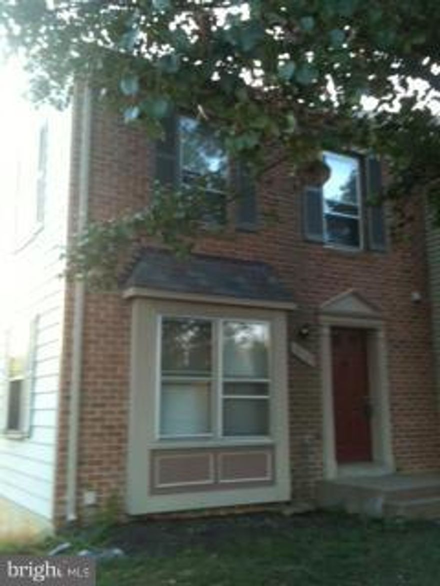 End unit brick front town home  Three bedroom 2 1/2 bath basement with corner fireplace sliding glass doors to fenced back yard.  Ceramic tile in kitchen and bath rooms separate dining room large living rm .Master bed rm has full bath  laundry room with washer and dryer storage room  house backs to trees and is on a small  cul -de -sac  street  $40 for each adult application fee  Pets case by case