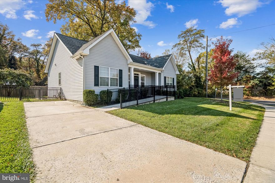 Welcome to this stunning 3/4-bedroom, 3 bath rambler nestled in a unique 7-home oasis on a quiet cul-de-sac in Riverdale. Built in 2017, this 2,800 SQFT home offers a sunlit open floor plan with vaulted ceilings and hardwood floors throughout the main level. The spacious kitchen features white cabinetry, quartz countertops, stainless steel appliances, and gas cooking — perfect for any home chef.
Freshly painted throughout, the home also offers ADA-compliant design, ensuring accessibility and comfort. The Dining Room opens to a patio and fenced backyard, ideal for outdoor relaxation or entertaining. Downstairs, you’ll find another large room with a closet and access to the full bath, which could be used as a bedroom, den/office, playroom, etc. and large family room — perfect for guests, in-laws, or a private retreat.
Enjoy off-street parking for four cars and a prime location just minutes from public transportation, the University of Maryland, and Washington, D.C. This beautifully maintained home combines modern style, functionality, and convenience in one exceptional package.