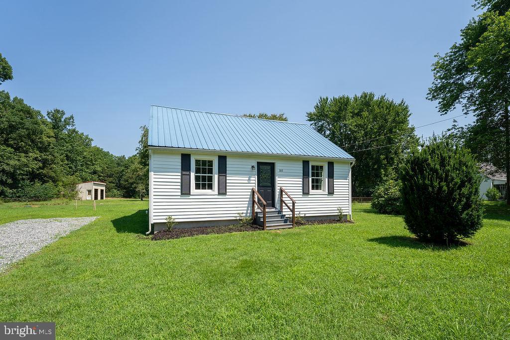 First time on the market. Cute 3 Bedroom, 2 Bath rambler with New flooring, New cabinets, New appliances, New countertops. Deck with stairs & ramp. 2 car detached garage/building.