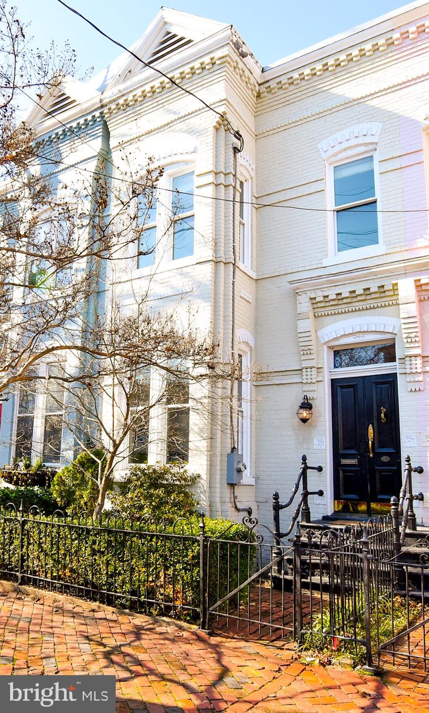 What a Showstopper!!! Treat yourself to this beautifully renovated, sun filled, spectacular home with the perfect blend on Modern Luxury and Historic Old Town Alexandria charm! The main level features 12+ foot ceilings, a converted open floor plan perfect for entertaining, and an updated kitchen with plenty of beautiful granite counter space, stainless steel appliances, and even a wine cooler. The kitchen leads to a private, peaceful, brightly lit patio in the back that is perfect for enjoying your morning coffee or unwinding after a long day. The upper level features two renovated bedrooms and two full baths. The magnificent main bathroom comes with a double sink vanity, beautiful marble countertops, and a very large rainfall spa shower. The basement is fully finished and offers enough space to accommodate a rec room, office area, and guests. Additional storage in the basement and attic. Located 1.5 blocks from King St, shops, and fine dining, less than a mile from the Metro, 5 blocks from parks and waterfront, a few blocks walk to two awesome grocery stores and easy access to many commuter options. Take advantage of being in the heart of Old Town. Many festivities minutes away: live entertainment, major events and celebrations, firework shows, and the Scottish Christmas Walk Parade passes your door on Saint Asaph.