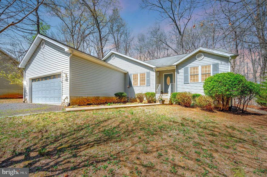 Welcome home to this attractive and comfortable split-bedroom rambler nestled in the woods at Lake of the Woods Lake and Golf Community.  When entering the foyer you can immediately feel at home. The 3 bedroom 2 bath boosts spacious rooms with a kitchen with ample counter space and cabinets that flows into a large Breakfast Nook. In addition there is a separate dining room for family holiday dinners and entertaining friends.  The large Living Room with stone fireplace and sit-upon hearth opens to a screened porch overlooking the private backyard with flagstone patio. The very spacious primary bedroom has it own exit to a deck to enjoy morning coffee.  The primary bathroom has double sinks, walk-in shower and adjoins a very spacious walk-in closet.  Two addition bedrooms and second bathroom are  on the other side of the house for total privacy.  Separate Laundry/Mud Room. Two car garage with extra storage space.  All in a Community with fun filled amenities including a two Lakes, 500 acre Main Lake and 24  Acre Keaton Fishing Lake,   PGA Golf Course, 2 Restaurants -- Clubhouse and Fairway Cafe,  two Olympic Swimming Pools,  9  Beaches, Equestrian Center, Tennis and Pickle Ball Courts, Dog Park, Basketball and Baseball areas, Playgrounds, Picnic and BBQ grounds, Community Center and planned activities for holidays throughout the year.  This house is ready for you to make it a home!