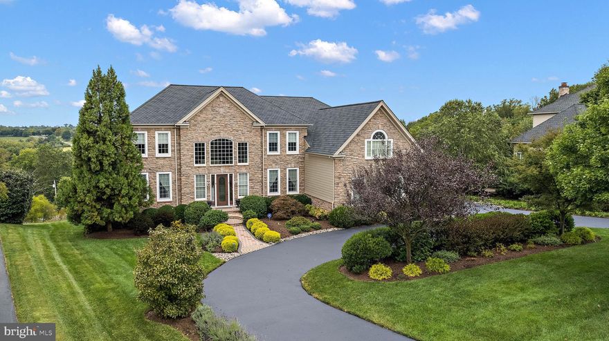 Welcome to this elegant and meticulously maintained home in the rarely available, sought-after Estates at Garnet Valley neighborhood.   The first floor offers formal living and dining room, a sunroom, kitchen with a Thermador professional stove and other premium appliances, beautiful twin curved staircase  opening to a spacious family room, 2 juliet balconies in foyer, chandelier lift, home office/library, laundry room, and 2 half baths. The second floor offers 5 bedrooms each with their own private bathroom, a bonus room which can be used as a playroom, movie room or could even be used as an extra bedroom.  The generously sized primary suite features a bathroom with a large shower with 2 shower heads and jet sprays, radiant heated floors, free standing tub, two walk-in closets and a sitting room with gorgeous views. The lower level of this house has a beautiful bar with a 300 bottle built in refrigerator, a full bath with heated floors, 3 tvs, plenty of space for exercise equipment , hobbies, pool table, and other fun! From touch free kitchen faucets,  humidifier, ionic air scrubber, whole house generator, 2 ev car chargers, 2 firepaces, 4 car garage with circular driveway, tankless water heater, 4 nest thermostats, newer windows, new roof and premium appliances, nothing has been left out of this home!   Located directly across from the Garnet Valley Schools,  shopping, restaurants, Costco, PHL airport, Wilmington Train Station, Delaware tax free shopping , medical offices, fitness centers and so much more!