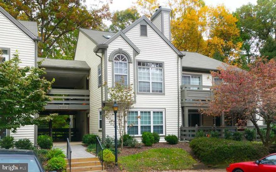 Welcome home to this beautiful freshly painted 2 bed, 1 bath unit in the popular Bristol House condo community in Reston! Enter into a welcoming foyer featuring cool tiled flooring and built in shelving for easy and convenient storage access. The spacious and open floor layout includes a living room with large windows letting in streams of light. It also features plush carpeting, and a wood burning fireplace with mantel. Easy access to the deck from the door to the side. Entertain guests easily in the formal dining room with 5 light chandelier. The kitchen features plenty of cabinet and counter space, tile flooring, and a deep sink with view that overlooks the living room. Also features all black appliances. Retreat to the main bedroom suite that features plush carpeting, walk in closet with custom shelving, and a separate vanity area with a neighboring full size bathroom. Convenient access to the stacked washer and dryer right in the French door closet of the bathroom. Both bedrooms feature floor to ceiling sliding glass doors that lead to the patio. Great Location less than 2 miles from the Metro & minutes to the Toll Road and Reston Town Center. Enjoy all the Reston Amenities including Community Pool, Tennis, Wooded Trails Right Behind Community, Tot Lots and More. Close to Reston Town Center, South Lakes Village Shopping Center, Restaurants, and WO&D trails. Enjoy the community grounds with mature trees and well landscaped gardens. You do not want to miss this one!