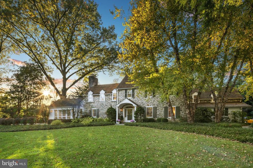 Have it all in one beautiful family home   the classic elegance of a Proper Main Line stone farmhouse, lush surroundings brimming with greenery, and a prime address in Gladwyne near all the amenities! It's easy to fall in love with 214 Glenmoor Road, the home you have been waiting for! Set on .99 acres of extremely private grounds on a very desirable street, here awaits an elegant gem to call your own. Enter the gracious central foyer through a wide front door with leaded glass panels. A grand, sweeping staircase ascends to the upper level, and rich wide-plank hardwood floors continue through to the main rooms. Entertain and relax in an ambiance of warmth and comfort, in the generously-sized living room with a lovely wood fireplace to cozy around. Family and guests can spill into the large formal dining room for sit-down meals, or have a cocktail or coffee on the enclosed, window-enveloped sunporch. Everyone will love to gather in the huge gourmet kitchen featuring radiant heated floors to warm your feet and a substantial center island with seating, perfect for food prep, serving hors d oeuvres, or watching the kids do homework! Adjacent is a fabulous family room with extensive built-ins and a gas fireplace. A powder room, and mudroom with closets, cabinetry with heated floors accessed from the attached garage, also sit conveniently off the kitchen. Upstairs, the sleeping quarters, accessed by main and secondary staircases, provide an oasis of calm. Unwind in your divine master suite with vaulted ceilings, and a gas fireplace flanked by built-ins. Also yours to enjoy is a generous walk-in closet for storage, and a stunning spa-quality bath offering heated floors, double sinks, a finely-tiled steam shower with bench, Jacuzzi tub in a windowed niche, plus a toilet and bidet. Additional family and guest rooms include a 2nd bedroom with en-suite bath with heated floors, 3rd and 4th bedroom sharing a Jack and Jill bath, plus 5th bedroom and hall bath, also offering flexibility for an office or den. A laundry area completes the 2nd floor. The finished lower level extends the living space with a carpeted recreation room with a gas fireplace and a bar. Storage is plentiful, and includes a walk-up attic with cedar closets. The location is superb, walkable to Gladwyne center, schools, parks, playgrounds, and a short drive to shopping in Suburban Square. For a taste of the city, Center City Philadelphia is only 12 miles away!