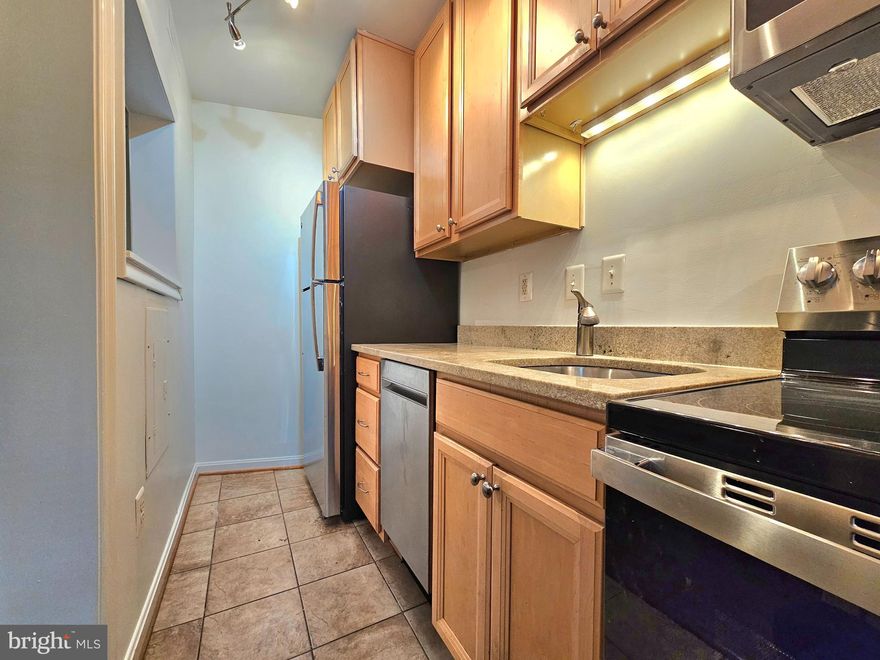 This top-level 2-bedroom, 1-bath condo features hardwood floors in the living and dining areas. The gourmet kitchen boasts stunning granite countertops, stainless steel appliances, a dishwasher, an electric range, and a built-in microwave. Both spacious bedrooms are carpeted for added comfort. Additional amenities include a card-operated laundry room, secured storage closet (storage room #2, first cage to the right #365), and bicycle storage (accessible via key fob in the adjacent building 1728...to the left of building door and down the ramp).

Parking is with county, $40/year for first car, $55/year for second car. Access to a private, off-street parking lot for residents (with permit).  Rent includes water and trash removal, tenant responsible for electric and cable/internet (Comcast/Verizon). 

Few places in the country offer the ability to seamlessly blend city life and tranquility quite like Colonial Village. Residents can stroll along winding pathways through beautifully landscaped gardens and courtyards, whether with their furry friends or on their own, and quickly access the vibrant urban scene nearby. 

Many options for transportation to Georgetown/Dupont Circle (DC Circulator, Blue Bus, near the Key Bridge), easy access to all the major commuter routes -- I-66, 29, 50, GW Parkway, I-495 & I-395. Located between Court House and Rosslyn metro stations. The Courthouse neighborhood features over 25 restaurants and bars, a movie theater, weekly farmers’ and flea markets, as well as Capital Bikeshare. Within a 2-mile radius, residents also have easy access to the many amenities of the Rosslyn-Ballston Corridor and Washington, DC.

Pet-friendly: Up to 2 dogs, no more than 50 lbs with breed restriction. Up to 2 cats OK.