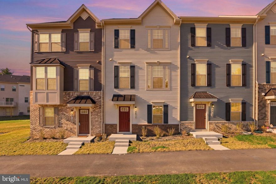 Nestled in the charming Montgomery Village, this exquisite Craftsman-style townhouse offers a perfect blend of modern luxury and inviting warmth. Built by end of 2024, this residence boasts 1,760 square feet of meticulously designed living space, ideal for those seeking a sophisticated yet comfortable lifestyle, in a almost brand new 1-YEAR OLD townhome. 

The welcoming entry level features a bright, open recreation room complete with a convenient half bath. A generous storage nook/walk-in closet ensures plenty of room for hobbies or seasonal gear.


Step inside to discover an open floor plan that seamlessly connects the kitchen, dining, and living areas, creating an inviting atmosphere for both relaxation and entertaining. The interior features are thoughtfully curated, showcasing elegant crown moldings, recessed lighting throughout the house, and luxurious vinyl plank flooring that flows throughout the main level. The kitchen is a culinary enthusiast's dream, equipped with almost brand new energy-efficient stainless steel appliances, and a spacious island that invites gatherings. A generous pantry ensures ample storage for all your culinary needs. 

Retreat to the serene master suite, complete with a spa-like en-suite bathroom featuring both a walk-in shower, offering a tranquil escape at the end of the day. Two additional well-appointed bedrooms provide flexibility for families, guests or a home office, while a convenient upper-floor laundry area and a hall full bathroom enhance everyday living. 

The exterior of the home is equally impressive, featuring a well-maintained lot that backs onto an open common area, providing a sense of privacy and tranquility. Enjoy the outdoors on your private expanded TREX deck, perfect for morning coffee or evening gatherings. Parking is a breeze with a two-car attached garage with 240V outlet ready for EV charging, and additional driveway space, ensuring convenience for you and your guests. The community offers a range of amenities, including common grounds and jogging/walking paths, promoting an active and engaged lifestyle. With views of lush trees and nearby parks, this home is a sanctuary that invites you to unwind and connect with nature. The property also features smoke detectors and carbon monoxide detectors, ensuring peace of mind. Experience the exclusive lifestyle this Montgomery Village townhouse offers, where luxury meets comfort in a vibrant community setting. This is more than just a home; it's a place where memories are made and cherished.