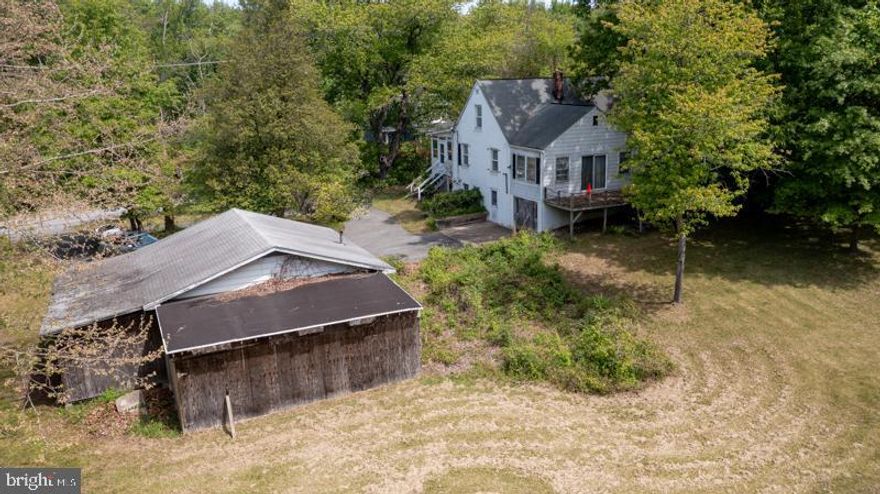INVESTOR / FLIPPER OPPORTUNITY - HIGH ARV POTENTIAL | BEST SUITED FOR CASH BUYERS. PHOTOS REFLECT CONDITION - EXTENSIVE RENOVATION REQUIRED.
Value-add opportunity with strong upside. Estimated $250K–$300K spread based on ARV (After Repair Value) and surrounding resale comps.
Area resale homes are selling in the $600s–$700s, with some reaching into the $800s–$900s—supporting strong ARV potential.
Situated on 1.26 acres—flat, cleared, and 100% usable—this property offers a rare combination of land and location in Glenn Dale. Enjoy a country-like setting while still being close to major routes, shopping, and everyday conveniences.
2,242 sq ft *Cape Cod, 3 BR  2 BA *Detached oversized 2-car garage  *Circular paved driveway *Public water & sewer in place.
LOCATION & LIFESTYLE VALUE:
Convenient to public transportation with New Carrollton Metro approximately 10 minutes away. Close proximity to NASA Goddard Space Flight Center and other major employment hubs. Neighborhood park just up the street along with access to the WB&A Hiker-Biker Trail—enhancing long-term resale appeal.
SOLD STRICTLY AS-IS. Ideal for investors or flippers—renovate or reimagine to maximize value, with potential to create a standout finished product in a desirable location.