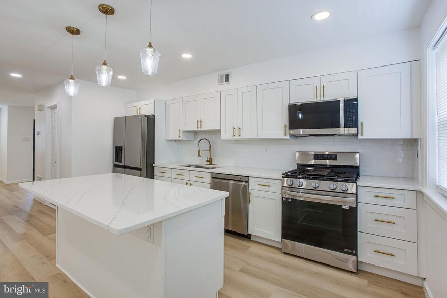 Introducing a fully renovated, turn-key property near Temple University, offering an exceptional opportunity for savvy investors and discerning homeowners alike. This 4-bedroom house, complete with additional space in the finished basement, is a prime choice for student housing or a personal residence, boasting potential rental income of $2,750 per month ($550 per room)—enough to cover any mortgage with substantial cash flow.

Every inch of this home has been thoughtfully updated to meet modern standards. Revel in the newness of everything: sparkling flooring, crystal-clear windows, top-of-the-line appliances, and a sturdy new roof overhead, ensuring worry-free living for years to come.

But the allure of this property extends beyond its walls. A dedicated parking spot eliminates the usual urban hassle, providing unparalleled convenience right at your doorstep.

Step into the future with this smart home, where technology enhances your living experience. An electronic front door keypad, wifi-activated stove, and motion-sensored exterior lights provide security and efficiency, while the latest Samsung washer and dryer set promises a hassle-free laundry day.

Nestled in a coveted location near Temple University, this home is not just a place to live—it's a lifestyle investment, offering the best of modern living and financial savvy. Whether you're looking to diversify your investment portfolio or find your next dream home, this property is sure to exceed your expectations.