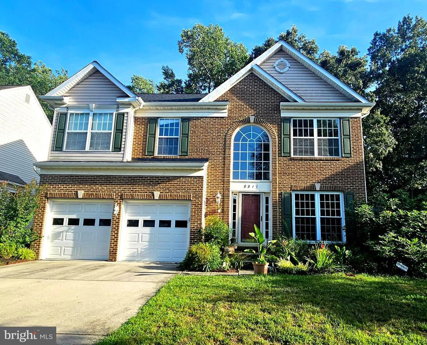 Stunning Brick Front Colonial in Prime Laurel Location
Welcome to this beautifully maintained and spacious brick-front Colonial, ideally located in the heart of Laurel, MD. Featuring 5 bedrooms and 3.5 bathrooms across three fully finished levels, this home blends classic charm with modern upgrades—perfect for today’s lifestyle.

Step into a grand two-story foyer and discover a light-filled, open-concept main level with gleaming hardwood floors, elegant crown molding, and expansive living areas. The gourmet kitchen is a standout, boasting granite countertops, a large center island, stainless steel appliances, custom cabinetry, a tile backsplash, and a walk-in pantry. The adjoining dining area flows seamlessly into the inviting family room with a cozy fireplace—ideal for gatherings or quiet evenings.

Upstairs, the spacious primary suite offers a walk-in closet and a luxurious en-suite "super bath" with dual vanities, a jetted soaking tub, and a newly renovated standing shower. Three additional bedrooms, a full hall bath, and a convenient upper-level laundry room provide both comfort and functionality for busy households.

The finished walk-out basement adds exceptional value, featuring a 5th bedroom with two big windows, a full bathroom, and a large open living area—perfect as an in-law suite, media room, or home office.

Step outside into your private backyard oasis, backing to serene woods. A spacious deck and patio are perfect for entertaining, while the in-ground lawn sprinkler system helps keep your landscaping lush and green with ease.  Solar panels add energy efficiency and cost savings—an eco-friendly bonus to this already exceptional home.

Recent updates include a new roof and HVAC system (2020), providing added peace of mind.

Centrally located near the USDA and other federal offices, with easy access to shopping, dining, parks, and major commuter routes, this home offers the perfect blend of comfort, location, and lifestyle.

Don’t miss this incredible opportunity—schedule your private showing today!