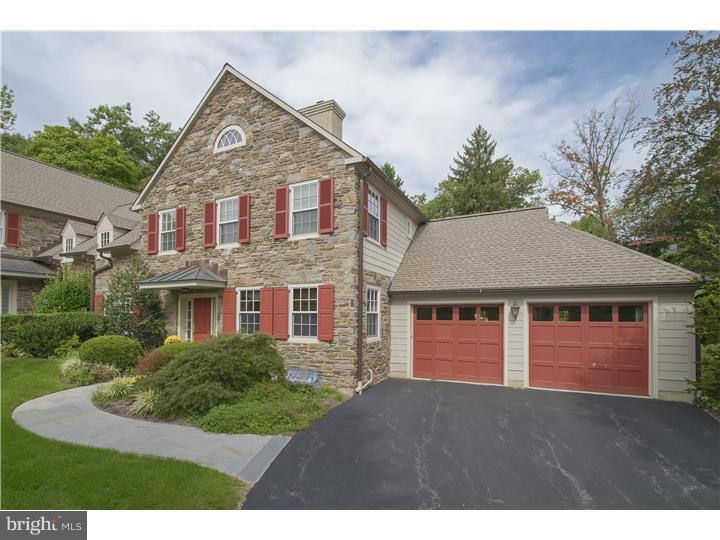 Pristine five bedroom Carriage home in the community of Strawbridge Court offers gracious "Right-sized" living with desired ease of a first floor Master Bedroom. Classic exterior architecture opens to a bright Foyer with gleaming random width floors and 9 foot ceilings. To the right of foyer find a handsome Living Room/Library with detailed and richly stained millwork and gas burning fireplace with light marble surround. A gracefully curved wall leads to the home"s formal Dining Room highlighted with multi-piece chair rail, crown moldings and large window overlooking the front gardens. A spacious, chefs quality Kitchen with honey toned Woodmode cabinetry and neutral granite counters offers double Wolf ovens, 600 series Sub Zero refrigeration and five burner gas Wolf cook top. Generous storage and flat prep space is found on the perimeter of the kitchen as well as on the large seated island. Steps away, and brightened by an added oversized window, is the Breakfast Room. Through a wide cased opening find the Family Room with vaulted ceiling, custom shelving and storage cabinetry, gas fireplace with honed black stone surround and double French door access to the Blue Stone Terrace. Professionally landscaped with an eye toward privacy, the terrace is ringed by evergreens and highlighted with low care flowering seasonal plants and shrubs. An ideal oasis for year round enjoyment. The first floor Master Suite offers true deluxe, end of day retreat space. Generous in size and gracious in appointment, the Master Bedroom is one of few in the community that offers uninterrupted views into the green, community maintained open space. A Crema Marfla marble bath provides the comfort of radiantly heated floors, double vanity marble sinks and separate jetted tub and water closet. His and Her fully outfitted closets are accessed through the Dressing Room, a space well suited for make-up area or additional furnished space. Ascend the front stair to three large Bedrooms and two full Baths outfitted with tub/shower and marble topped vanities. A large Bonus Room (20" x 20" ) with 14" vaulted ceiling functions best as upstairs Library, family space, fifth Bedroom or work-out gym area. Superior, bright, turn-key living, 17 minutes to Philadelphia center.
