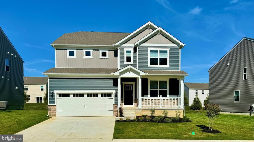 A brand-new home under construction at 69 Buttercup Circle, Elkton, MD, in our newest community Barksdale Crossing, is now available. The Hampshire is an exquisite home, boasting an impressive 4,279 square feet of luxurious living space. Revel in the elegance of five bedrooms, four bathrooms, a spacious loft area, and a two-car garage. 

Step into the home, where a grand formal dining room welcomes guests, setting the stage for unforgettable gatherings. The foyer unfolds into a sought-after open-concept living space, showcasing a gourmet kitchen adorned with stylish stone gray cabinets, ample quartz counter space, and a sizable, contemporary island overlooking the casual dining area and living room. A downstairs bedroom and full bath, discretely tucked off the living room, serve as a perfect guest suite or home office. 

Ascend the staircase to discover a large loft area, an upstairs laundry, and three additional bedrooms, including the opulent owner's suite. This sanctuary features a cozy sitting area, an expansive walk-in closet, and a sumptuous bathroom. The allure extends to a finished basement, complete with a recreation room, an additional bedroom, and a full bathroom. 

This Hampshire also includes white window treatments, an upgraded interior trim package, a fully sodded, irrigated, and landscaped yard, and the exclusive Smart Home® package through ADT giving you complete peace of mind living in your new home. 

Pictures, artist renderings, photographs, colors, features, and sizes are for illustration purposes only and will vary from the homes as built. Image representative of plan only and may vary as built. Images are of model home and include custom design features that may not be available in other homes. Furnishings and decorative items not included with home purchase.