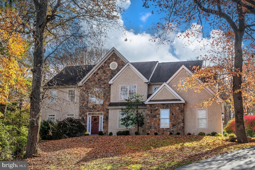 Nestled in a completely private and scenic section of sought after Radnor Township, this well maintained traditional open floor plan home is waiting for you to make it your own. 
This home has 5 bedrooms and 4.1 bathrooms.  Enter into a Center Hall with a dramatic 
staircase leading up to the second level with lovely Hardwood flooring throughout the Main Level  To the left of the Center Hall you will find a beautiful formal Living Room and formal Dining Room  Off the Dining Room is a large gourmet Kitchen featuring more Hardwood Flooring, an Island work space, double ovens, Command Center, a spacious Breakfast area that opens up to the Fabulous Deck and backyard.  There is also a Mud Room with Cubbies, Custom Built -Ins and Coat Closets.  The adjoining 2 story casual Family Room has a Fireplace and Back Stairs to the Upper Level.  To the right of the Center Hall there is a Library/Home Office and Powder Room completing this level.  The upper level features a large Main Bedroom au-Suite with 2 Walk-In Closets andBath,with  a soaking Tub and separate Shower.  There are 3 additional bedrooms and two more Bathrooms.  One is actually a Jack and Jill Suite.  The other is an Au-Suite.  Finally, the enormous Lower Level is fully finished with an At Home Gym Space, Media Room and an additional Bedroom and Bath.  Conveniently located in Newtown Square, Radnor Township with its award winning school district, Close to Shopping, Public Transportation, Major Highways and Rail Lines. This home has it all....A MUST SEE