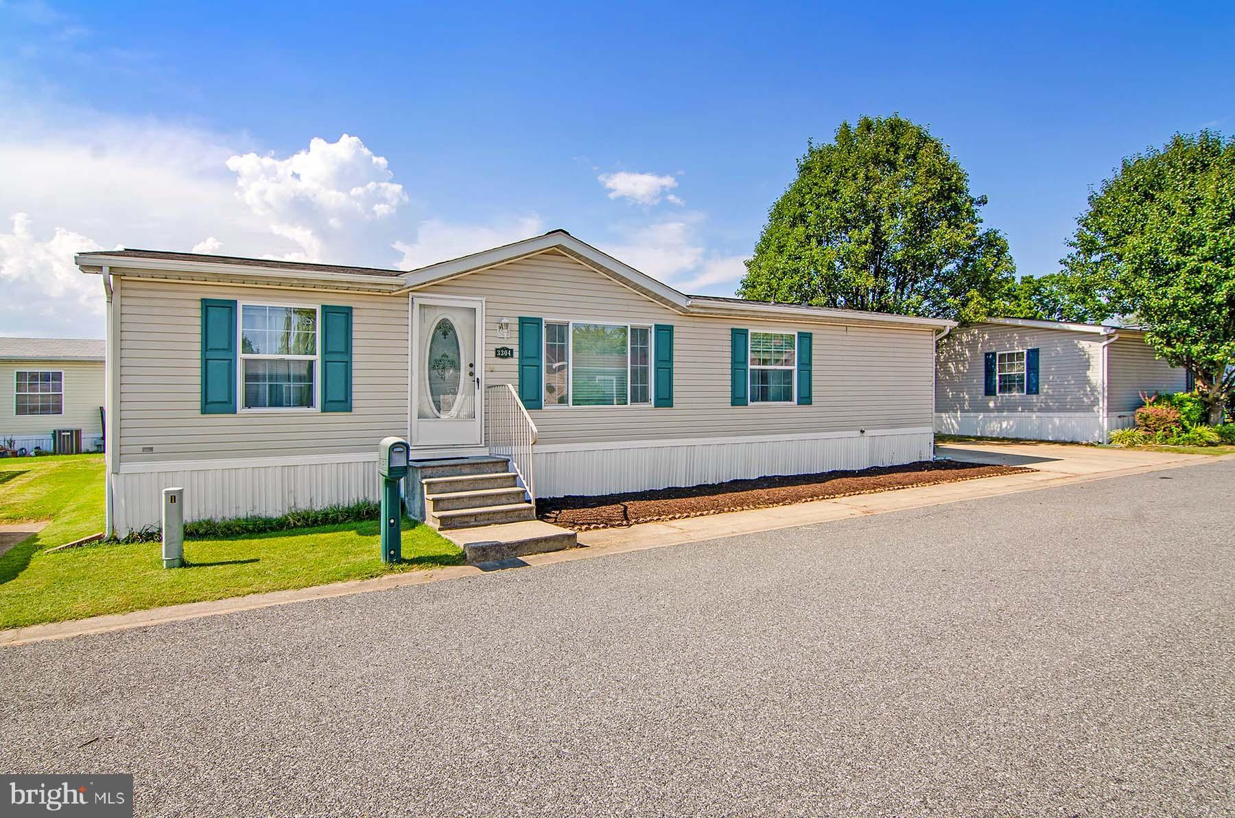 This mobile home is located in the desirable Peppermint Woods/Williams Estates community, which features many community amenities to enjoy. Inside, the home is bright and airy. You'll find three bedrooms and two full bathrooms, including a primary bathroom with a jacuzzi tub! When it's time to relax and enjoy the breeze, you will love the large covered deck. The home also includes a parking area for two vehicles.
Updates include a new roof in 2020, new carpets in 2021, and a new air conditioning system in 2017.
Buyer must be pre-approved by Park Management.