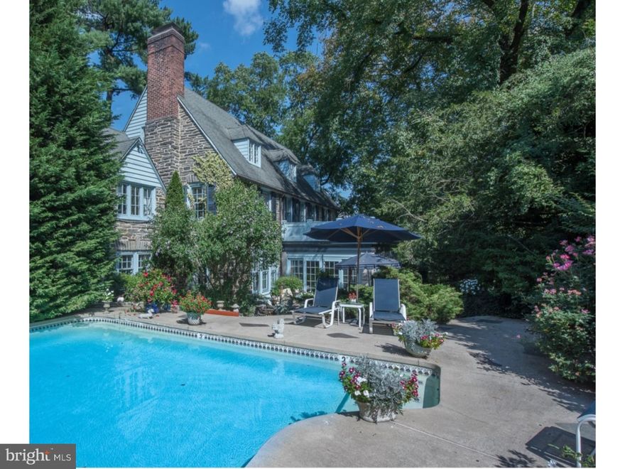 Return to gracious living in this lovely classic Main Line Stone Colonial located on one of Northside Haverford's most coveted lanes. There is exquisite detail throughout with beautiful moldings and windows in a beautifully landscaped private setting. The Foyer welcomes you with its wide central staircase, Palladian window, beautiful French doors and step down private Powder Room. The Living and Dining Rooms offer spacious formal settings which include marble fireplaces, crown moldings, French doors and hardwood flooring. The Study features built-in bookcases and French doors which open to the spacious Sunroom. The light filled Sunroom offers 3 sided exposure and French doors which lead to the beautifully landscaped and private patio and pool area surrounded by stunning landscaping. The eat-in Kitchen features Rutt custom cabinetry, a center island, planning desk and an informal dining area. Off of the Kitchen you will find a large laundry area with second Powder Room and an outside entrance to the pool. The second floor features the Master Bedroom with fireplace and built in cabinetry, a generous walk in closet with dressing area and a Master Bathroom with double vanity and steam shower. This floor offers a Bedroom with an en suite Bathroom, a spacious third Bedroom, a Hall Bath and a Nanny/In Law Suite which has a private outdoor entrance, features a Bedroom, separate sitting area with Kitchenette and full Bath. The third floor offers a spacious 5th Bedroom with vaulted ceiling, a 6th Bedroom, hall Bath and Office. This property also features a three car Garage, built-in generator with auto switch, mature landscaping and a new septic system installed in July 2014. This very special home is best described by charm, exceptional quality and sophistication. Truly a remarkable gem of the Main Line! Please note: Seller is in process of appealing his assessment to lower his taxes.