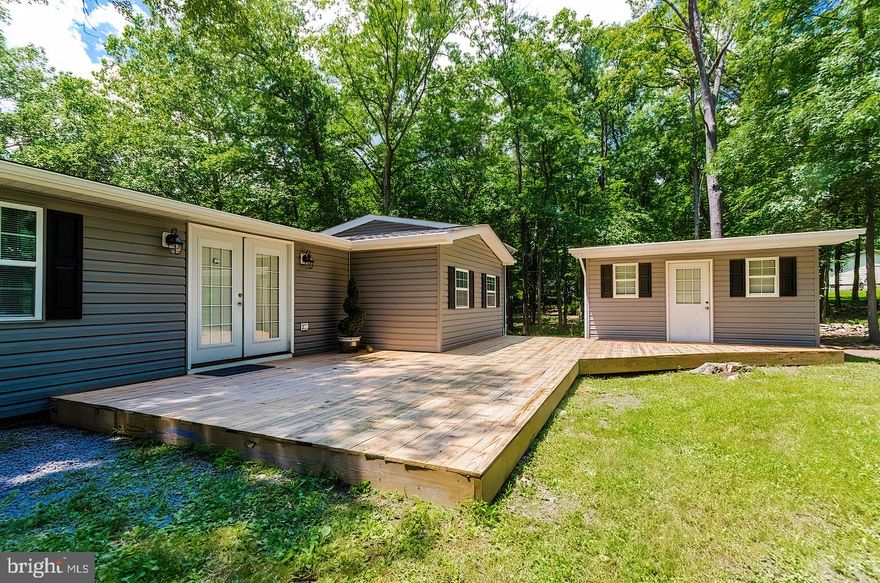 Great retreat on the mountain in Harpers Ferry! Riverview Park has water access to the Shenandoah River. This is a fully renovated and beautiful property! All new floors, new roof, new kitchen, new bath, new gutters, new deck, new , new, new!! It also comes with 4 additional lots that can remain undeveloped for a total of 1.45 acres. These 4 lots are actually in Shannondale on Wild Turkey Road or the 4 can be combined for 1 buildable lot! Do not miss the chance to spend the summer on the Shenandoah River and/or Lake Shannondale because this purchse includes all 6 lots in both developments. A unique and awesome opportunity for so many reasons!!