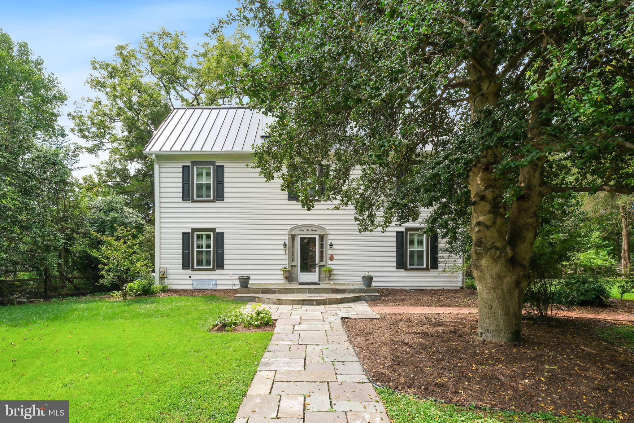 North Bethesda!! The Original Estate at Mazwood – A Rare Find in Heritage Walk
Welcome to The Original Estate at Mazwood, a beautifully maintained non-historic farmhouse built in 1900, perfectly situated on a private 0.74-acre lot in the highly sought-after Heritage Walk community. This charming home blends timeless character with thoughtful modern updates, offering endless potential—live comfortably as-is or build your dream home on this rare, oversized property.
Step inside to find gorgeous original hardwood floors, rich with warmth and history, and bask in the natural light pouring in through newer, energy-efficient windows. The updated kitchen boasts granite countertops and opens into a bright, spacious breakfast area with a wall of windows overlooking the serene, tree-lined backyard. Step out onto the large deck, perfect for entertaining, relaxing, or enjoying peaceful mornings in nature.
This inviting home also features:
Updated bathrooms with heated flooring in both the master and hall baths, main level laundry for ultimate convenience, plantation shutters, recessed lighting throughout, fresh paint, built-ins, and gleaming hardwood floors, durable and classic newer tin roof, newer siding, insulation for comfort and efficiency, an expansive asphalt circular driveway with loads of parking space, a detached two-car garage providing added storage or workshop potential.
All of this is just minutes from I-270 & I-495, shopping, restaurants, schools, and more. Homes like this don’t come around often—a unique combination of charm, land, and location
Don't miss your chance to own this one-of-a-kind estate—schedule your showing today!