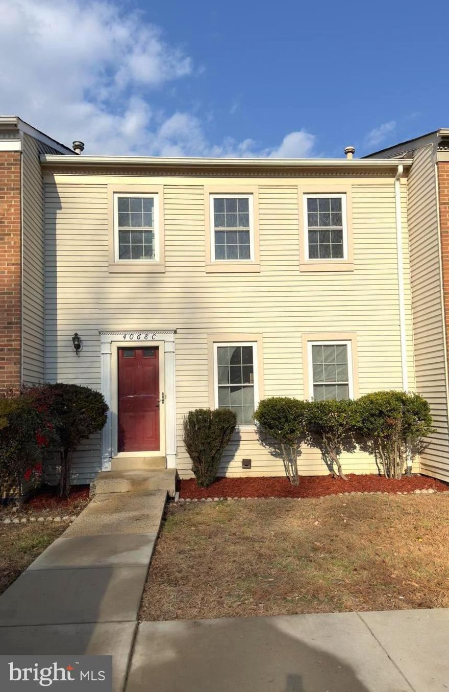 Move-in ready, recently renovated townhouse featuring a beautifully updated kitchen with quartz countertops, modern cabinetry, hardwood floors on main and entire upper level. 3 Bedrooms, 2 full bathrooms and laundry room on upper level including a principal bedroom with walk-in closet. Half bathroom on main level. Walk-out basement with plenty of natural light, full bathroom and extra room that can be used for home office or guest room. Entire basement with new and beautiful LVP flooring. Fenced backyard with large patio, Perfect for buyers seeking modern finishes, low-maintenance living, and exceptional value. 2 assigned parking spaces with plenty of guest parking. Excellent location with quick access to major highways, shopping, restaurants, schools, public transportation and everyday conveniences. An ideal choice for first-time buyers.