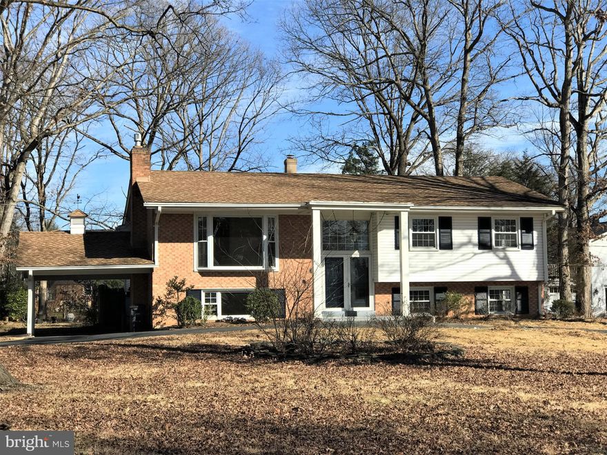 Priced to Sell! Beautiful Split Foyer, front portico,circular driveway, huge corner lot. Spacious rooms, wood floors, sun room, gourmet kitchen, SS appliances, entirely renovated bathrooms, beautiful grounds, one of George Washington's orig farms. Huge space, huge potential, great family home. 5 Min to Ft Belvoir.  A must see home.