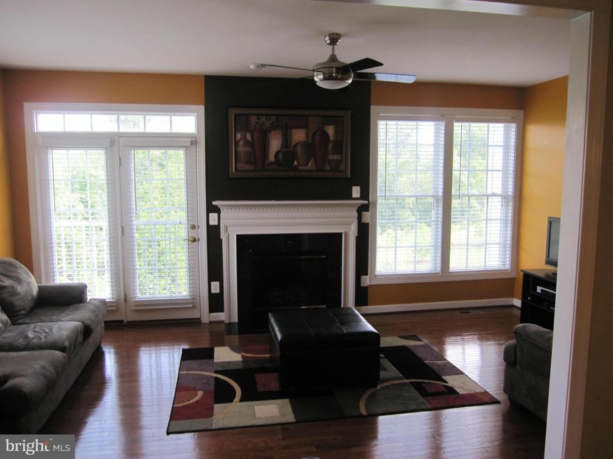 Gorgeous and almost new 3 BR and 3.5BA townhouse in desirable Villages of Urbana. This home is comprised of three bedrooms and two full baths on the upper level and a family room, living room, dining room, a powder room and a kitchen on the main level. The walk out finished basement has a spacious recreational room, a wet bar and a full bath.