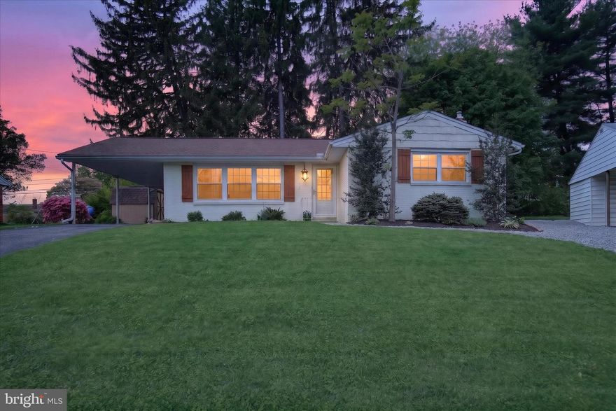 Welcome to 77 Hillside Circle, a thoughtfully updated brick ranch in Camp Hill offering a functional layout with modern touches throughout. Hardwood floors flow through the main living area, complemented by soft natural light and neutral tones. The updated kitchen features white cabinetry, stainless steel appliances, and a stylish backsplash, opening to a dining area highlighted by custom bench seating crafted from repurposed school desks. The main level includes 3 comfortable bedrooms and full bath. The finished lower level expands the living space with a fourth bedroom with egress, a second full bath, and flexible space for a family room, office, or guests. Outside, enjoy a manageable yard and classic curb appeal. Conveniently located near shopping, dining, and commuter routes, this home offers a blend of character and everyday practicality.