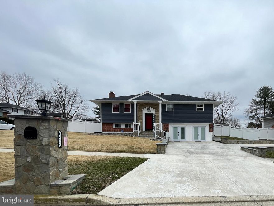 🏡 Welcome to 3537 Kings Point Rd, Randallstown, MD! This beautifully updated split-level home offers 4 bedrooms and 2.5 bathrooms across 1,613​-plus square feet of finished living space. Nestled on a generous corner lot, this home has been completely updated within the last 5 years by the current owners—nothing is older than 5 years! ✨ Interior Highlights: Open-concept main level with elegant tray ceilings and custom lighting. Stylish kitchen featuring stainless steel appliances, granite countertops, white cabinetry, and a sleek range hood. Spacious living and dining areas with bold red and white accents, creating a striking and sophisticated ambiance. Lower-level family room with a cozy, relaxed vibe—perfect for entertaining or unwinding. Currently a dedicated theater room with plush seating and a home entertainment system for a true cinematic experience. Garage conversion adding a second lower-level lounge area— ideal for entertaining, relaxing or creating a private retreat. Two sets of French doors open directly onto the spacious 6-car driveway, seamlessly blending indoor and outdoor living and providing easy access for gatherings or quiet evenings under the stars. 🌟 Outdoor Living: Expansive covered deck with red cushioned seating—ideal for entertaining or relaxing. Spacious fenced backyard offering privacy and room for outdoor activities. Ample parking with a 6-car driveway. 🚪 Additional Features: Modern laundry area with top-of-the-line appliances. Newer flooring, windows, HVAC, roof, and all major systems—all updated within the last 5 years! Convenient access to major highways, shopping, and dining. This home is truly turn-key and ready for its next owner. Don’t miss the opportunity to make this stunning property yours—schedule a showing today!