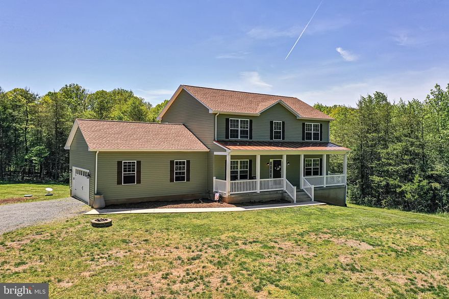 Less then 5 years old!  No HOA!! Don't miss out on this Beautiful 5 Bedroom 3.5 Bathroom with 2 car Side Loaded garage on 4.5 acres!  This home is situated in a nice quiet area, tucked away from noise and offers a lot of privacy!  Have your morning coffee or hang out with friends with a glass of wine at this beautiful front porch, that is the entire length of the house!  The main level offers a In-Law suite with a full bathroom and walk in closet, Beautiful engineered high end hardwood floors, open layout with breakfast counter and space for table open to a large living room area with a gas fireplace.  Upstairs there are a total of 4 bedroom, 2 bathrooms and the laundry area.  The spacious upstairs Master has Cathedral ceilings and a spa like bathroom with double vanity and a gorgeous walk in closet. The other 3 bedrooms are all generously sized. There is additional 1200 square feet of unfinished space in the walk out basement, with rough in for a bathroom and ready for you to design and finish, or for extra storage space.  A nice 12 x 16 shed was just added couple of years ago and it stays with the house.  This home is connected to fast speed internet through StarLink and the seller may transfer the service to the new owner for no interruption.  The house has an enterprise class booster, the high gain LPDA external antenna and two internal antennas located in the attic to boost your signal.  That's Perfect, especially if you work from home!  The owner installed a Culligan whole house water softener and water filtration system and the HVAC units are serviced twice a year. Current owner has a service contract that is transferable to new owner.  Pictures don't do justice to this Beautiful Home! Check the 3D tour and schedule an appointment to see this home in person!