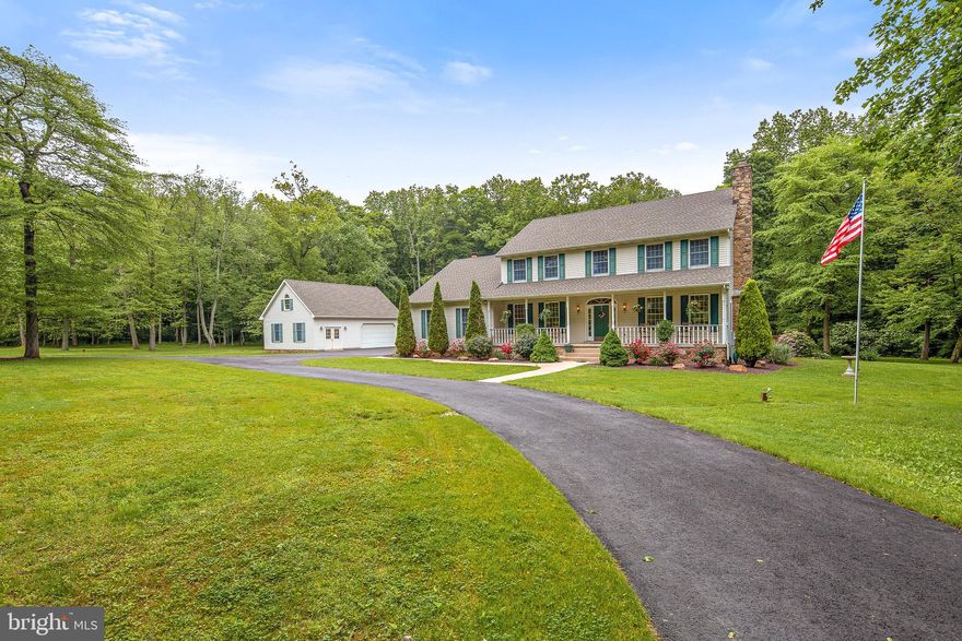 This spectacular home rests on over three private acres in the peaceful countryside of Fair Hill. Upon arriving, you'll enter a horseshoe driveway, and immediately notice the amount of love and care that this home has experienced by the original owners. There is a abundance of space for parking, as this property included a two car attached and three car detached garage. The detached garage has two car bays and a designated shop. Steps from the shop, an unfinished loft stretches above the three car garage. There are endless possibilities with this space, as it already has power, and could easily be finished. A covered porch with views of the expansive front yard adorns the front of the home. Inside, the two story foyer opens to the office, living room, and hallway toward the kitchen. The living room features a gas fireplace with a stunning mantle and crown molding. The living room flows into the elegant dining room with white chair railing, crown molding, and bay window to the wooded backyard. The large kitchen has a peninsula for seating and a center island with a prep sink. It has granite counter-top, tile backsplash, new appliances, and under cabinet lighting. The large eat-in area divides the kitchen from the family room and screened in porch. The living room has a stone gas-fireplace, cathedral ceiling, and skylights making the room both inviting and grand. The laundry room includes cabinets and a utility sink, which allows it to double as a mudroom, as it connects to the garage entry. The updated powder room rounds out the first floor.Upstairs, the master suite was built to impress! The suite included cathedral ceilings and has a walk in master closet that seems never-ending. Through the master closet you will find another room that can be used for additional storage, hobbies, or clothing. The four piece master bath has a double vanity with a granite counter-top, jetted tub, and shower. Three additional bedrooms, and the full hall bathroom complete the second floor.These home features are only outdone by the exterior property which includes a screened in porch, deck, and pool. The screened in porch is set up with speakers, a panoramic view of the woods, and is the perfect place to wind down for the day. The spacious deck is large enough to accommodate additional seating and a grill to entertain guests. This property will be a wonderful place to call home.PLUS:  New driveway and new carpet,  updated water softener, heater, air conditioner, roof,  appliances, and more!