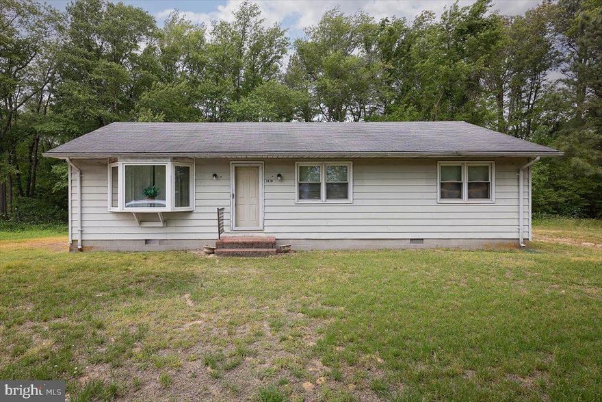 Welcome to this charming ranch-style home situated on approximately 0.92 acres in rural Hurlock, MD. This 1-story residence offers 1,008 sq ft of living space featuring 3 bedrooms, 1 full bath, a spacious living room, dining area, kitchen, and laundry room. Enjoy peaceful country surroundings with private water and sewer, off-street driveway parking, and plenty of outdoor space for gardening, recreation, or future possibilities. Conveniently located near local amenities while offering the privacy and tranquility of country living. Great opportunity for owner-occupants or investors alike!
