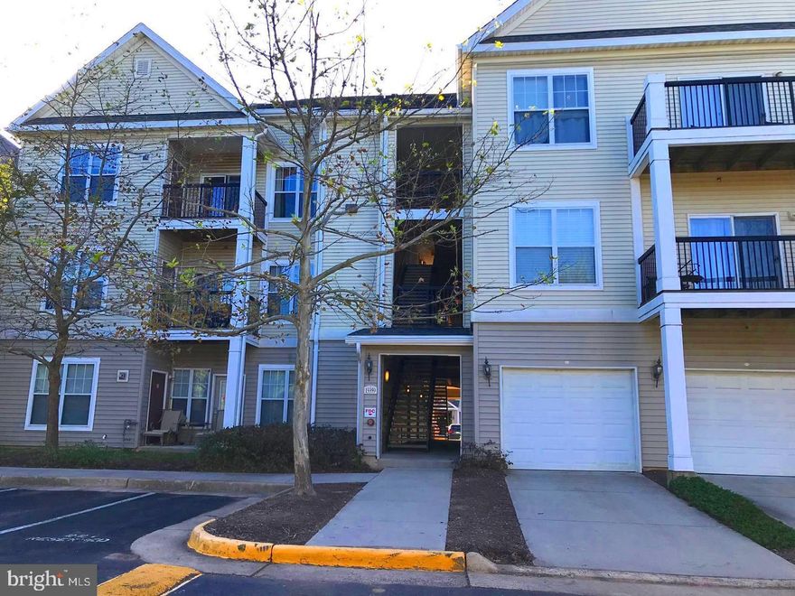 This luxurious 2-bedroom, 2-bathroom condominium with a versatile loft is situated within a gated community. The home features hardwood flooring throughout and an open floor plan, with a charming kitchen that flows seamlessly into the dining area. The spacious loft, complete with a closet, is perfect for a bedroom or home office and overlooks the living room, which boasts vaulted ceilings and a skylight. Enjoy the convenience of a private garage and ample guest parking. The community offers a 5,000 sq. ft. clubhouse with a café bar, fitness center, and more. With easy access to major routes and the Fairfax County Connector Bus, this home provides both comfort and convenience. Water included in rent.  For Zillow inquiries: Please refrain from emailing. For the fastest response, kindly contact the listing agent directly by phone.