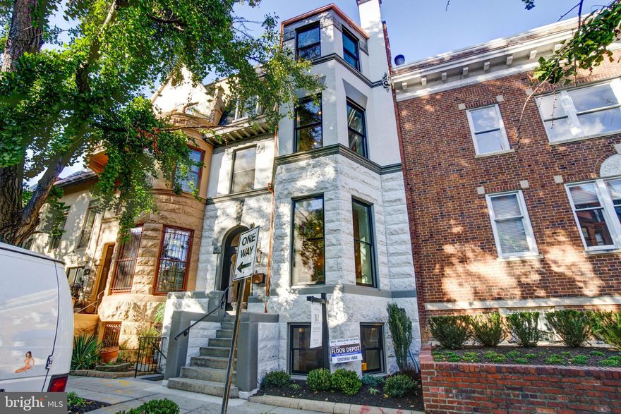 Prepare to embark on a journey of unparalleled luxury in a prime location within the heart of the nation's capital. Welcome to Dilan Homes' latest masterpiece, 1717 Swann St NW. This exceptional residence seamlessly harmonizes the enduring charm of the original Colonial architecture with a host of contemporary amenities, culminating in an unrivaled living environment that truly sparkles with distinction.

As you step inside, prepare to be captivated by the custom light fixtures, casting an inviting glow over the meticulously crafted spaces. The kitchen is a culinary aficionado's dream, featuring top-of-the-line Viking appliances, a striking Bertazzoni stove, and sleek quartzite countertops that glisten with an aura of modern elegance. Every detail is thoughtfully designed, from the custom cabinets adorned with Emtek hardware to the exquisite Brizo fixtures that add a touch of artistry to your daily routines. Take a walk to your rooftop deck to take in the breathtaking view of the city.

The bathrooms throughout this resplendent home are equally adorned with high-end Kohler fixtures, creating an atmosphere of indulgence and refinement.

And the location? Impeccable. Just a stone's throw away from the Dupont Metro & U St. Metro stations, grocery stores, a hardware store, pharmacy, and a charming dog park, this residence offers unparalleled convenience. With the U St. corridor, Adams Morgan and Dupont Circle at your doorstep, a world of exceptional restaurants and entertainment venues await, catering to your every desire.

As you enter this magnificent gem with five-bedroom, four-bathroom and two and a half baths gem, you will immediately notice the meticulous attention to detail that has gone into its renovation. Say goodbye to the urban parking frustrations, as this home generously provides two designated parking spots at the rear, reserved exclusively for your convenience. Imagine a life free from the endless quest for parking spaces!

1717 Swann St. NW is more than just a home; it's a sanctuary of luxury and comfort, ideally situated in the heart of our nation's capital. Don't let this opportunity slip through your fingers. Act now, seize the chance to make this exquisite residence your dream home, and experience the ultimate blend of historic elegance and contemporary luxury in the heart of Washington, D.C. Your luxurious lifestyle awaits—schedule a viewing today!