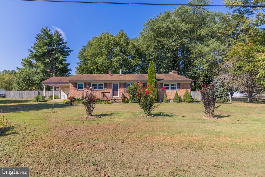 Wonderful opportunity to snatch up a 4 bedroom rambler in Hollywood on a large, fenced in lot in a convenient and quiet location! Home is priced to sell, need some updates and TLC but is still move in ready and provides  an opportunity for a new buyer to tailor their own fresh updates! This home features an eat in kitchen, a washer and dryer, a covered carport for parking and a large family room with a fireplace! Book your showing today!