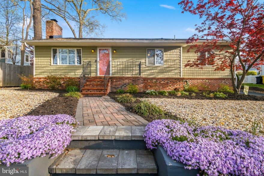 Nestled in the serene community of Herald Harbor, this exquisite ranch-style home offers a perfect blend of luxury and comfort, ideal for those seeking an exclusive lifestyle. With a major renovation completed in 2019, HVAC & encapsulated crawlspace in 2023, this residence boasts a modern aesthetic while retaining its charming character. Step inside to discover an inviting open floor plan that seamlessly connects the living, dining, and kitchen areas. The spacious living room features a stunning stone fireplace, perfect for cozy evenings, while large windows and skylights flood the space with natural light. The gourmet kitchen is a chef's dream, equipped with stainless steel appliances, upgraded countertops, and ample table space for casual dining. The combination of LVP and ceramic flooring throughout adds warmth and elegance. This home offers three generously sized bedrooms, including a primary suite with a luxurious soaking tub and a separate stall shower in the en-suite bathroom. The walk-in closet provides ample storage, while built-ins and recessed lighting enhance the overall ambiance. Additional features include a convenient main floor laundry area and thoughtful window treatments that ensure privacy and comfort. The exterior of the property is equally impressive, featuring extensive hardscape, exterior lighting, and oversized detached workshop/mini garage. Enjoy outdoor living on the charming brick patio or relax on the inviting porch, surrounded by beautifully landscaped front and rear yards. The level lot, spanning 0.17 acres, provides ample space for recreation and relaxation. Located just a mile from the Severn River, this home offers water-oriented living with private access for boating, fishing, and swimming. The community amenities include basketball and tennis courts, picnic areas, and tot lots, fostering a vibrant neighborhood atmosphere. With a paved driveway and on-street parking, convenience is at your fingertips. The property is situated in the middle of the block, providing a peaceful retreat while remaining close to local attractions. This residence is not just a home; it's a lifestyle. Experience the perfect blend of luxury, comfort, and community in this remarkable property. Don't miss the opportunity to make it your own!