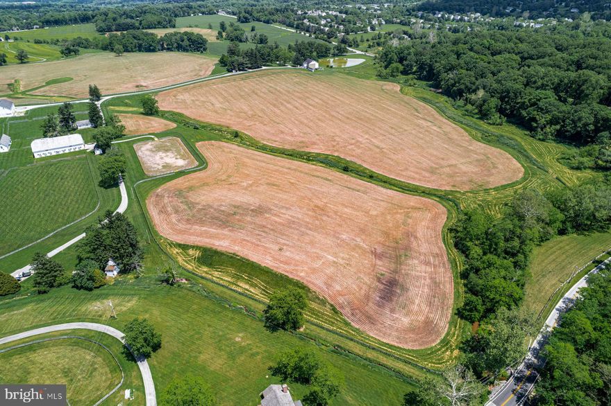 This spectacular, vacant 35.08 acre lot is under conservancy, with breathtaking views, and is now available to its next lucky stewards. It also offers access to the 206 acres that are also under conservancy with  Westtown Township and the Natural Lands Trust, to offer passive walking trails.  This incredible already subdivided parcel was once part of legendary "Crebilly Farm",  one of Chester County's largest and most scenic farms, owned by the same family since 1937, in all of its spectacular beauty, surrounded by acres of historic, protected pastoral views. A favorite property in Westtown Township, it offers every necessary ingredient for those interested in a pastoral living environment, agricultural, livestock, wellness or equestrian pursuits.  Conservancy documents are available and allow for 1 primary residence, several secondary structures such as horse barns, car collection facilities, pool houses,  guest accommodations, swimming pool, tennis/ pickleball courts and more. Build your own dream compound with complete privacy yet close to renowned schools, shopping, restaurants, transportation, Philadelphia International Airport and more.