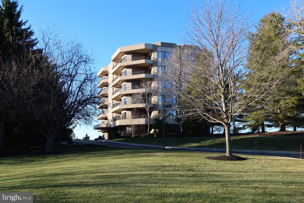 Exceptional condominium opportunity at the Summit offers a distinctive State College experience. Wrap yourself in luxury with exquisite style, care-free living, near shopping and bike/walking paths. Value a secure entry system and elevator service direct to your private dwelling. Take in sweeping mountain views and fresh breezes from expansive windows and terraces. Impressive selections and finishes are displayed throughout this outstanding residence including marble, hardwood, tray ceilings, French and pocket doors, handsome moldings and trim work. Discover a spacious, well-appointed custom kitchen featuring Bosch stainless steel appliances including an induction cooktop and sweet breakfast nook. Walls of beautiful cherry built-ins enhance the library/family room, a favorite relaxation area. Special occasions are remembered and celebrated in the formal dining room. The primary bedroom en suite is a lovely retreat beckoning refreshment and renewal. Two more bedrooms, full bath, living room, half bath, laundry/utility room, gallery foyer and elevator entry area complete this incredible dwelling. Note additional Summit amenities: luxury guest suite, guest apartment w/kitchen, workout room, two below grade parking spaces, heated in-ground 20'x40' swimming pool, temperature-controlled wine cellar, storage area, and an on-site building manager.