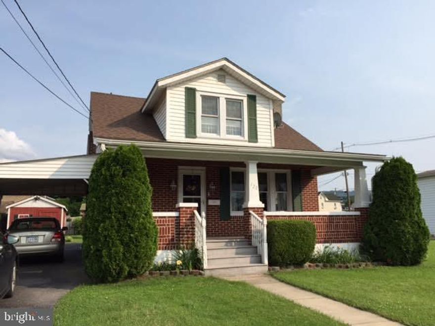 Adorable 1 1/2 story brick home.  Newly remodeled and move-in ready. Replacement windows, newer roof, new furnace, new front porch and rear deck, carport and fenced in yard with shed. Walking distance to schools, grocery store and downtown shopping and dining. Call today for your personal tour!