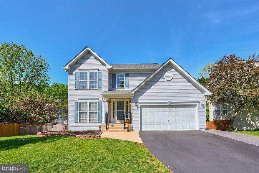 Welcome to 5 Wild Plum Court, Stafford, VA.  Nestled in the tranquil Autumn Ridge community, this meticulously maintained three-level Colonial offers both comfort and style.  The welcoming step-down foyer includes a remote-control solar-powered blind above the front door window, leading into a spacious living room with carpet, which flows into the dining room featuring a bay window and decorative columns. In the rear of the home, you'll find a well-equipped kitchen with oak cabinetry, recessed lighting, a stainless steel farmhouse sink, a new dishwasher, a gas cooktop, and a refrigerator. The kitchen opens to a light-filled morning room, perfect for casual dining, and a family room complete with a cozy gas fireplace.​

Upstairs offers a large primary bedroom with a walk-in closet, ceiling fan, and an ensuite bath featuring a jetted tub, double vanity, and heated floor. Three additional generously sized bedrooms and an updated hall bath with ceramic tile and a new exhaust fan complete the upper level.  A walk-in laundry room near the garage includes a washer and dryer, which convey with the home.​  The large front-load garage provides plenty of storage space, and the spring was replaced in July 2024.

The home features elegant oil-rubbed bronze hardware throughout, with new ceiling fans in the family room, morning room, and upstairs bedrooms. The walk-out basement boasts a spacious recreation room, a legal 5th bedroom, a fully updated bathroom with a beautifully tiled shower, and ample storage space. Outdoor living is enhanced by a stamped concrete patio off the rear basement door, a deck beneath the upper deck, and garden planters ready for your summer vegetables. Enjoy seasonal treats from the boysenberry, raspberry, and blackberry bushes in the backyard.​

According to Stafford County, the high school zoning is scheduled to change to Colonial Forge High School beginning in 2026. 

Fun things to do that are close include the National Museum of the Marine Corps, Ferry Farm, Potomac Town Center, Aquia Landing, Crows Nest Natural Area Preserve, and the Stafford County Farmers Market.

Experience the comfort, convenience, and charm of this wonderful home and its surrounding attractions.