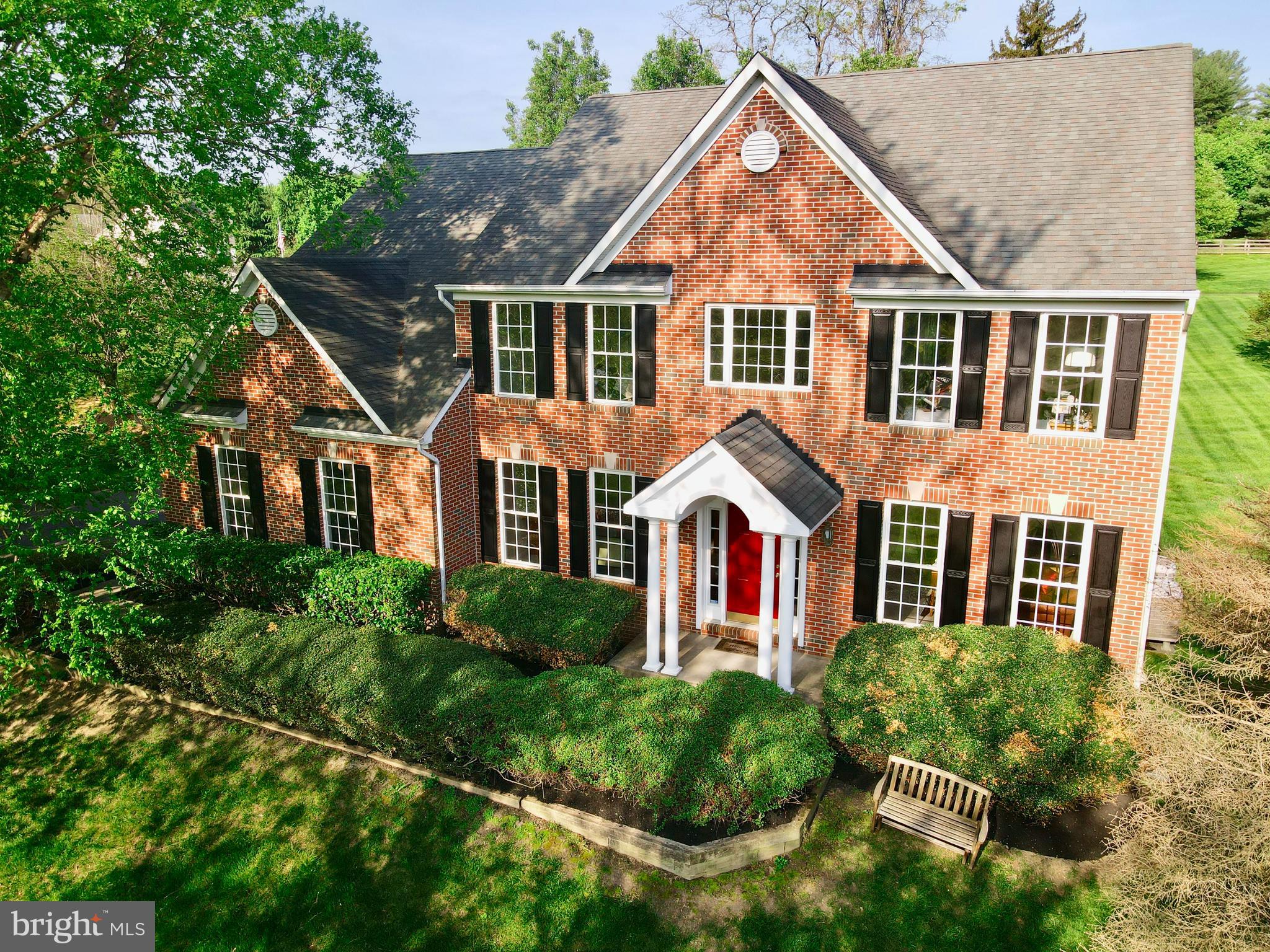 GREAT PRICE !!! **Check out the video tour** Welcome to this beautifully situated brick front home perched on a scenic hilltop, offering both privacy and charm. Freshly painted throughout and featuring brand new carpet, this move-in-ready residence combines timeless elegance with modern comfort.
Step into the grand two-story foyer that flows effortlessly into a dramatic two-story family room, highlighted by cascading windows and a striking two-story fireplace that floods the space with natural light. The spacious gourmet kitchen is a chef’s dream—complete with an oversized island, ample cabinetry, and seamless access to a relaxing screened porch, perfect for outdoor dining or peaceful morning coffee.
The main level also features a desirable FIRST FLOOR BEDROOM AND FULL BATH ideal for guests or multigenerational living in addition to a first floor half bath. Mature trees and professionally landscaped grounds create a tranquil outdoor setting, ideal for enjoying the surrounding nature.
Located just a short walk from Pig Tail Recreation Area, where you can fish or boat at the reservoir, and only minutes from Clarksville’s premier shopping and dining destinations, this home offers the best of both convenience and serenity.
Don’t miss your chance to own this exceptional home in a truly special setting. Schedule your private tour today!
