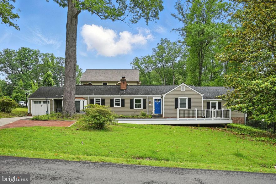 This inviting home offers a harmonious blend of classic character and modern amenities, set on a flat, half-acre, corner lot in the heart of Vienna.
The architectural elements, including a historic dutch door, built-ins, exposed brick, and decorative ceilings bring the charm. The eat-in kitchen, featuring a Wolf range, is completed by stainless steel appliances, granite countertops, and rustic wood flooring. Adjacent to the kitchen, the sunroom addition, with its stone floor, tongue and groove wood ceiling, and one of the home's three stunning stone fireplaces, serves as a cozy retreat for relaxation and gatherings. Expansive windows invite natural light to fill the rooms, highlighting the beauty of the hardwood, stone, and tile floors throughout.
The home is meticulously maintained and offers convenient, main level living with four bedrooms and two baths. The basement with a separate entrance and crawl space for added storage, adds function to this already impressive home. The garage is more than a spot to park, with Ceilume flooring, full insulation in the walls and ceiling, and climate control for year-round comfort.
Outdoor living is enhanced by an extensive Trex deck and stone walkway at the front, a brick patio in the rear yard, and beautifully landscaped surroundings. For a little escape, head down the brick patio to enjoy a cocktail or a book in the she-shed, or sit together around the fire pit. Additional storage is found in the large, wooden shed in the side yard. 
HVAC 2018. Garage AC 2024. Trex deck 2022. 55 year shingle roof replaced 2014. Hardiplank siding. Updated electrical, ducting, and gas lines. No HOA.
Close to downtown Vienna, as well as quick commuter conveience with easy access to the metro, the beltway, and 66.