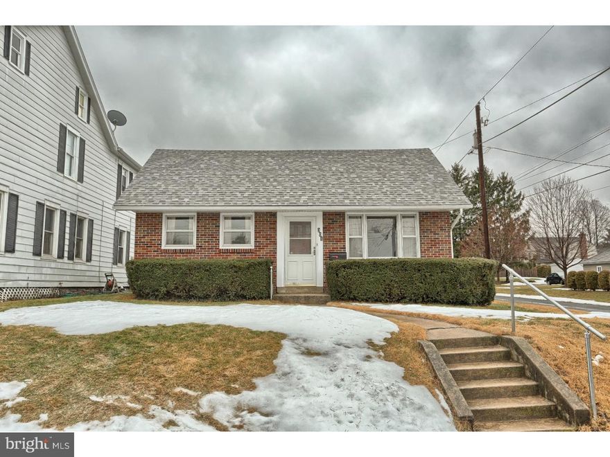 Is this what you've been waiting for?  Solid brick ranch on a corner lot within walking distance to Kutztown University, schools and downtown Kutztown.  Easy main floor living with living room, eat-in kitchen with breakfast bar, master bedroom with walk-in closet and ceiling fan, 2nd bedroom with full closet, main floor full bath. Walk-up attic with electric heat could be a 3rd bedroom. In addition, there is a fantastic finished basement with (radiant) flagstone floor, wood burning fireplace, wet bar and 2nd full bath with shower stall. Outside there is a nice covered porch that allows you to enjoy the outdoors and still be covered. 2 car detached garage with electric garage door opener. Additional features include new roof, water softener, updated electrical, 10 year old furnace, window A/C units and ceiling fans. Seller will be doing some improvements to the property (which should be completed within 3 weeks of listing property). Carpeting in bedrooms, hall and living room will be removed by seller to expose hardwood floors underneath. Seller will also be having a brand new tub and shower installed in the main floor bath by a professional.  These improvements only add to what this home already has to offer. Make an appointment to see if this is for you!