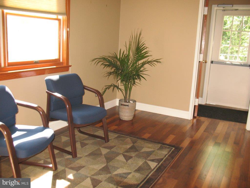 Large Corner office avaiable- tons of natural light. Your office away from home! !!! Unfurnished office with plenty of storage . Reception area, small kitchenette and restrooms are available for use. Three other offices are occupied. Heat, central air, water, Sewer included. One assigned parking space. Not retail, no customers, just office space. Smaller interor unit avaiable as well.