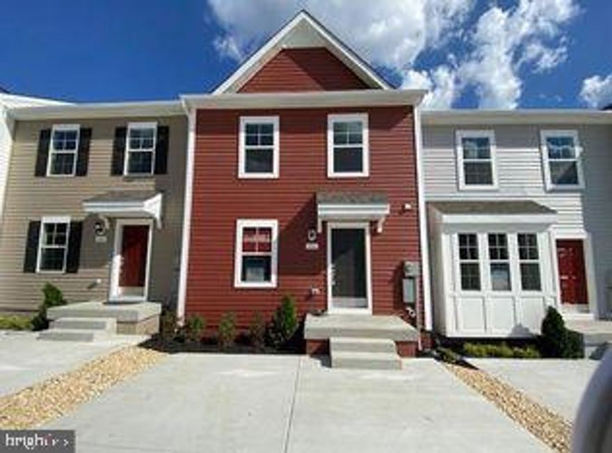 Discover your dream home in Jefferson County with this newly constructed 2023 Colonial Townhome, offering stunning views of the Blue Ridge Mountains. Located in historic Charles Town, WV, you'll be just minutes away from shopping, restaurants, schools, and the local casino. Embrace the vibrant Townes at Tate Manor community, with Jefferson Memorial Park and the charming town just a short walk away. Its prime location near the MD and VA lines makes it perfect for commuters, blending the tranquility of a scenic retreat with easy access to neighboring states. This home combines the ease of first-floor living with the expansive space of a three-story design. The first floor features a contemporary kitchen with stylish finishes, seamlessly connected to a generous living room—perfect for both relaxing and entertaining. Upstairs, retreat to the owner's suite, where you'll find a spacious walk-in closet and a luxurious, spa-like bathroom. Two additional bedrooms at the front of the home offer privacy and comfort for family or guests. The fully finished basement provides a versatile bonus room, ready to be customized to your needs—whether it's a home office, gym, or entertainment area.  With a driveway accommodating up to four cars, parking is always hassle-free.  An EV charger is already installed for your electric car! Don’t miss the chance to make this 2023 Colonial Townhome your personal haven in Jefferson County. 
*Credit score must be 600+ and proof of monthly income 3x the rent.
To apply, click the link below:
https://apply.link/RihwCHM