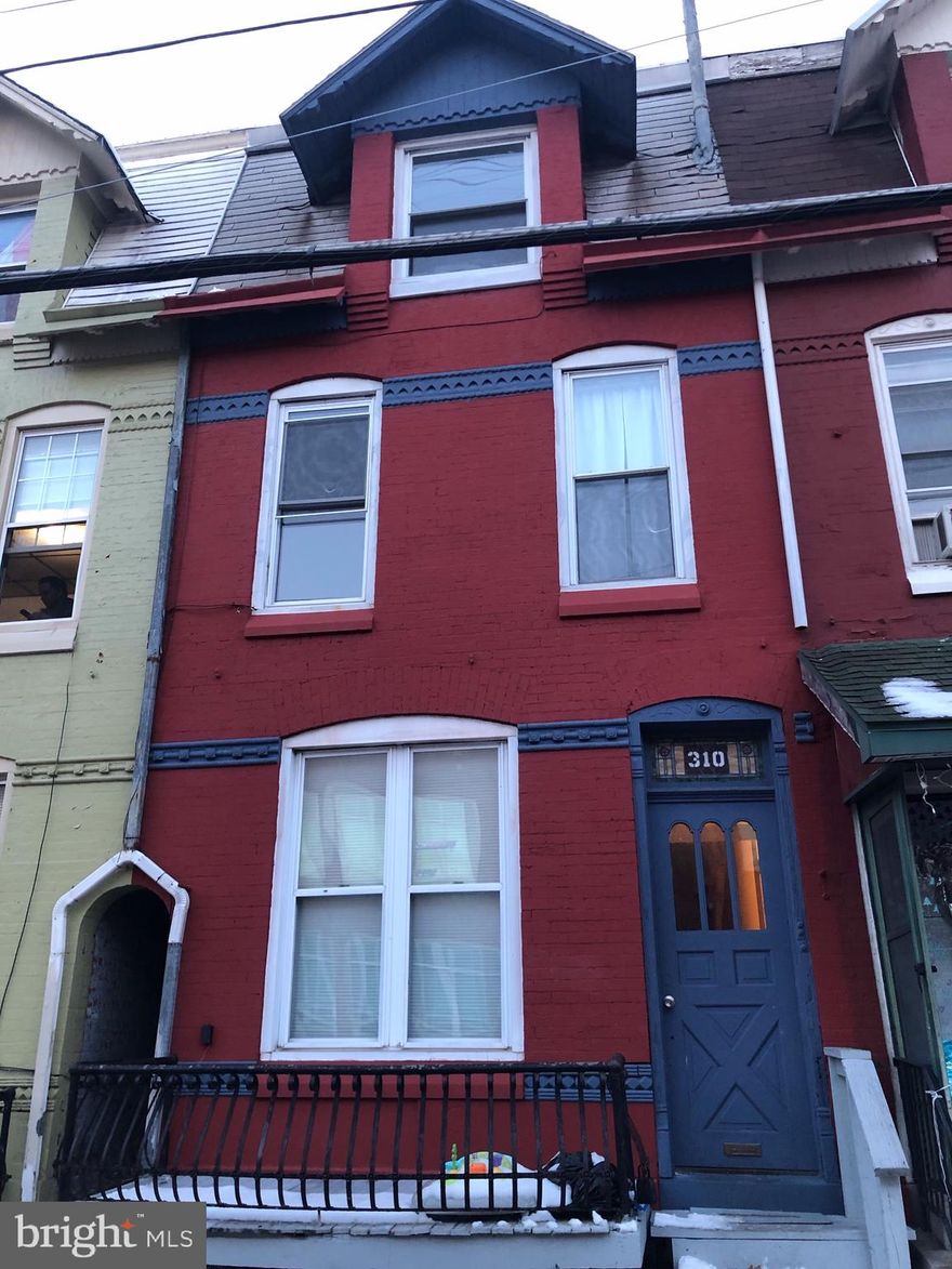 Three unit apartment building.  One occupied at $750/M.  Two vacant needing a little TLC to re-rent.