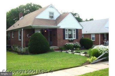 REDUCED! A nicely maintained brick Cape Cod waiting for a new owner! Spacious rooms, wood floors and an updated kitchen. Upper level master bedroom area with a dressing room attached. The lower level has an extra kitchen and a family room with a gas fireplace and plenty of storage space. Rear enclosed porch and a nice yard for family and pets. Come and see!