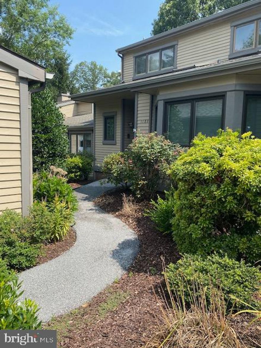 Welcome to 1183 Princeton Lane, a stunning Springton model home nestled in the sought-after community of Hersheys Mill. This residence offers a perfect blend of elegance and functionality, beginning with a grand two-story foyer featuring a graceful curved staircase and marble floors.  Half bath tastefully tucked here also.  The main level showcases beautiful hardwood floors bathed in natural light from a wall of windows. Imagine cozy evenings by the wood-burning fireplace or hosting gatherings in the expansive dining and living areas. The kitchen is a culinary enthusiast's dream, boasting extensive counter space, island and a breakfast area.  Outdoor lovers will appreciate deck backing up to private area adorned with trees and shrubs ideal for relaxation and entertaining. The spacious primary suite on the main level includes a thoughtfully designed closets, complemented by an oversized bathroom.   The second floor offers a versatile loft area, two additional bedrooms, and a full bath, and 2nd floor family room providing a private retreat for guests. The expansive lower level offers endless possibilities with a large open area, wet bar, and full bath. Ample storage solutions include built-in and free-standing shelving.  The community amenities includes tennis courts, pool, library, and more. Enjoy one year of free House Membership to the clubhouse. Discover the perfect blend of comfort and community living at Hershey's Mill. Schedule your visit today to embrace this extraordinary lifestyle opportunity!