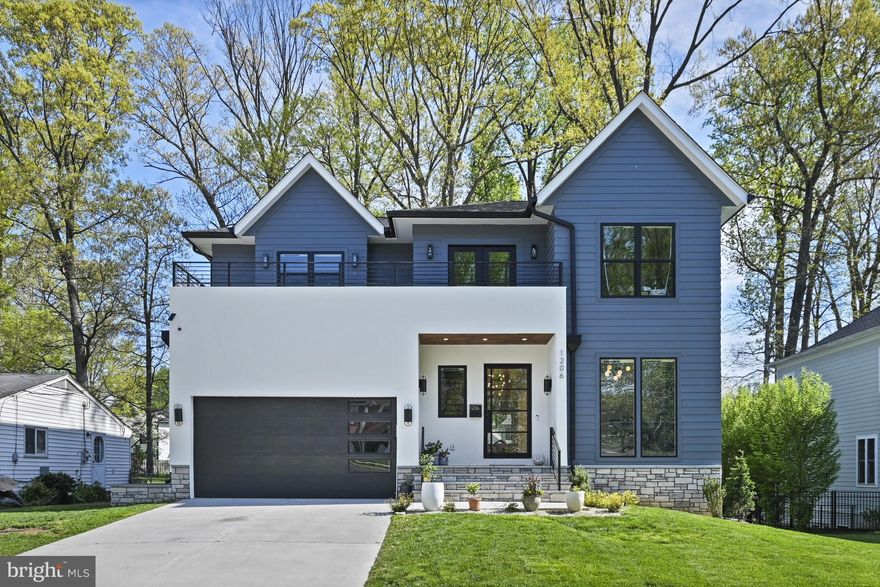 APPRAISED ABOVE ASKING - BUYER FAILED TO PERFORM. Welcome to 1206 Cottage St SW, an extraordinary residence in coveted Vienna Woods. Reluctantly offered due to unexpected job relocation, this exquisite 2023-built contemporary home features 5 bedrooms and 4.5 bathrooms across 5,147 square feet of thoughtfully designed living space. The current owners have enhanced this already impressive property with premium upgrades, including custom automatic blinds throughout, a professionally landscaped backyard with a play set, elegant built-in bookshelves in the basement, an under-sink reverse osmosis water filtration system, fresh paint, an EV charger, and outdoor security cameras.

The beauty begins outside with tailored HardiPlank siding complemented by stucco and stone, a 2-car garage, spacious balcony, sundeck, and a tranquil 0.23-acre lot dotted with majestic trees. Inside, the flowing open floor plan showcases 10-foot ceilings, solid red oak hardwood flooring, custom woodwork, exposed beams, two fireplaces, and abundant windows that bathe the home in natural light. The main level impresses with a formal living room featuring a tray ceiling and floor-to-ceiling windows, an elegant dining room with a Sputnik chandelier, and a stunning family room with exposed beams and a custom floor-to-ceiling fireplace. The spectacular gourmet kitchen boasts quartz countertops, custom cabinetry with under-cabinet lighting, designer tile backsplashes, and top-tier appliances, including a Monogram 6-burner gas cooktop with grill.
The upper level offers a luxurious owner's suite with tray ceiling, dual walk-in closets with organizers, and a lavish bath featuring a dual-sink vanity, freestanding soaking tub, and oversized shower.

 A junior suite with private bath, two additional bedrooms sharing a Jack-and-Jill bath, and a convenient laundry room complete this level. French doors open to a large balcony—perfect for morning coffee or evening relaxation. The light-filled lower level provides a versatile living space with an expansive recreation room, custom wet bar, and custom-built-in bookshelves creating a distinguished library/media room ambiance. A fifth bedroom with private access to a full bath makes an ideal guest suite, while a bonus room offers additional flexible space.

This exceptional home combines contemporary elegance with move-in-ready convenience in one of Northern Virginia's most sought-after locations. Conveniently located near I-66, I-495, express lanes, Metro, and minutes from the vibrant downtown Vienna, Tyson's Corner, and Mosaic District.
