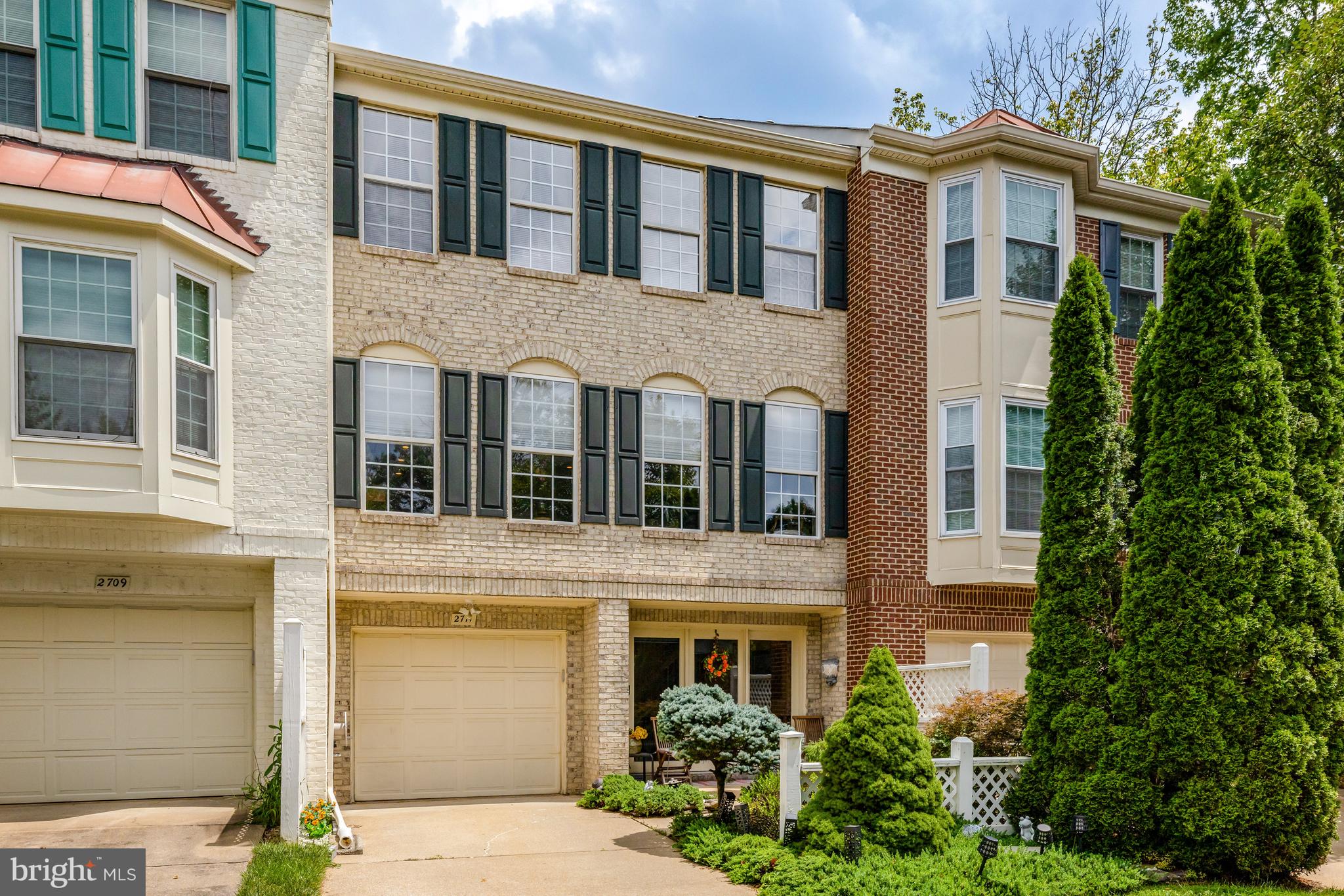 HUGE PRICE REDUCTION! Open House Sat Aug 16 1:30-4:00 & Sun Aug 17 1:00-3:00. Updated TH directly adjacent to Vienna metro. Plenty to love, where to begin? Extremely practical and intelligent floor plan for this Hampton model. ALL three and a half bathrooms have been updated within the past 5 years. Grand entry foyer on ground level (LL) flows to 4th bedroom/flex room with updated full bath featuring roll-in shower and grab bars. Sufficient closet space and built-ins, could be used as home office or rec room also. Heated tile flooring adds a luxury feel. French doors open to spacious wood deck and brick patio and walkway featuring lovely garden w/ planting beds and fenced rear, plus lined trees add to the privacy and peaceful setting. Main level features truly open floor plan w/ kitchen/family room combo. Raised dining room w/ wood capped knee walls and recessed lighting. Kitchen island w/ newer SS appliances and granite counters w/ tile backsplash. Family room opens to large wood deck w/ automatic retractable awning. Upstairs features primary bedroom w/ beautiful cherry floors and updated bathroom, dual vanity, soaking tub and separate shower. Good sized 2nd & 3rd bedrooms share an updated hall bath. Roof replaced July 2017, HVAC October 2019, water heater April 2022. Super-easy access to 66 & 495, as well as Town of Vienna.
